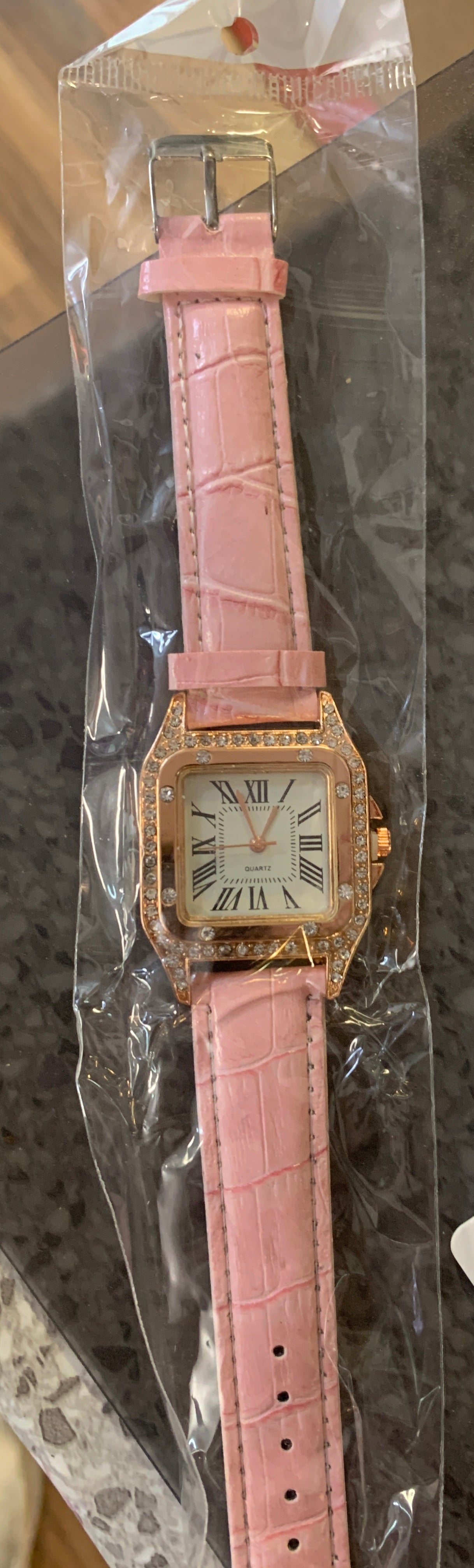Woman’s faux diamond watch and bracelet set